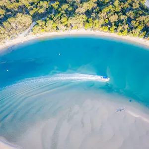 Aerial View of Noosa River with boat passing through