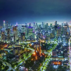 Aerial view Scene of Central Business District of Melbourne City with Modern Office Building and St Patrick's Cathedral at night, Melbourne Aerial view Scene of Central Business District of Melbourne City with Modern Office Building and St Patrick's Cathedral at night, Melbourne
