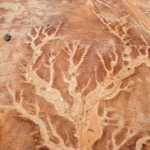 Aerial viewpoint looking down on the dry river beds and cracked earth of outback Australia Aerial viewpoint looking down on the dry river beds and cracked earth of outback Australia