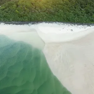 Aerial Views over iconic Burleigh, Gold Coast with blue water and sandy beaches