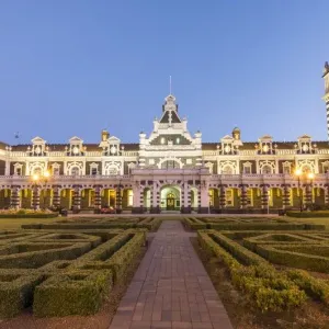 Anzac Square and train station at night, Dunedin, Otago, South Island, New Zealand