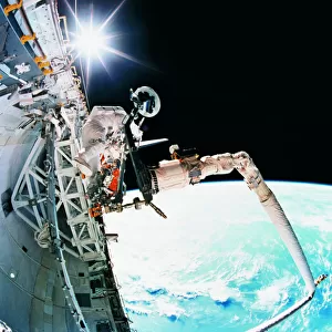 An astronaut working in space