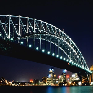 Australia, Sydney, Harbour Bridge with Opera House and city, at night