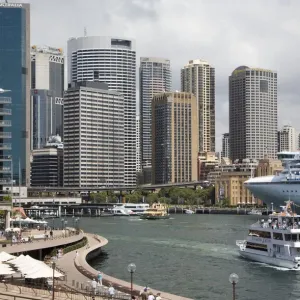 Australia, Sydney, tourist boat and cruise ship in Circular Quay Australia, Sydney, tourist boat and cruise ship in Circular Quay