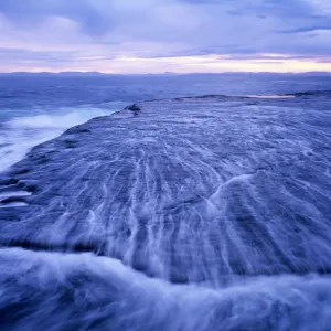 Australia, Tasmania, water washing over wave platforms