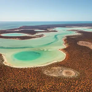 Big Lagoon in Francois Peron National Park shot from an aerial point of view on a sunny day, Shark Bay, Western Australia, Australia