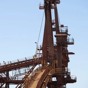 A bucket wheel reclaimer in an iron ore mine
