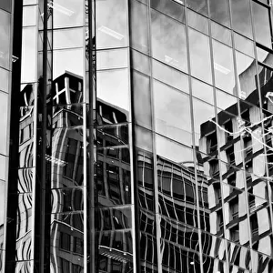 Building reflections on a high rise building