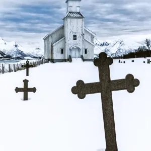 Church in GimsA┼¥y with graveyard during winter time