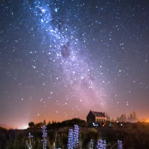 Church of The Good Shepherd and Milky Way with lupins blooming, Lake Tekapo, New Zealand