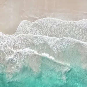 Clean sandy beach with ocean waves. Sleaford Bay. Eyre Peninsula. South Australia Clean sandy beach with ocean waves. Sleaford Bay. Eyre Peninsula. South Australia