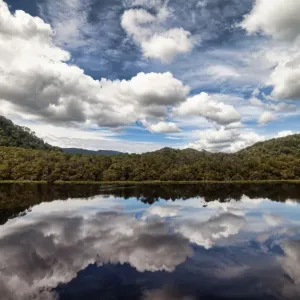 Clouds reflection on river Clouds reflection on river