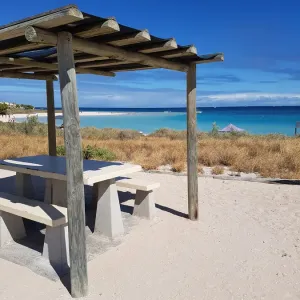 Coral Bay Beach and sunshades