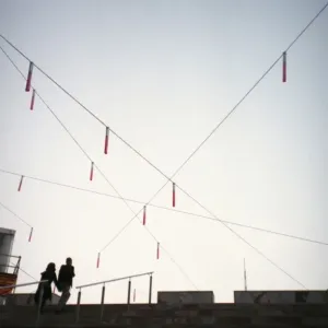 Print of a Couple Standing on Stairs