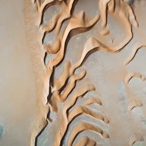 Curvy desert dunes taken from above, United Arab Emirates