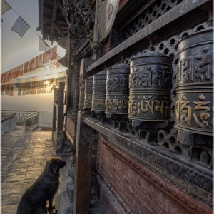 Dawn at Swayambunath temple and Prayer wheels used in worship, Western Himalayas, Nepal