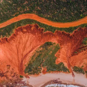 Dirt road and rock formations photographed from above, James Price Point, Australia