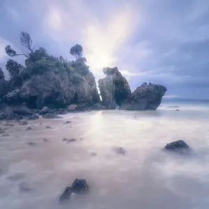 A dramatic rocky shoreline at dawn in Victoria, Australia A dramatic rocky shoreline at dawn in Victoria, Australia