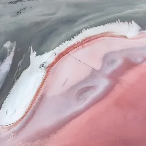 Drone photograph showing a majestic pink coloured salt lake Drone photograph showing a majestic pink coloured salt lake