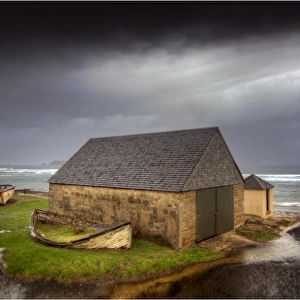 An early spring storm whips along the coastline of Sydney bay, Norfolk Island