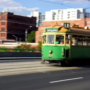 Electric tram traveling at speed Electric tram traveling at speed