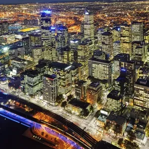 Elevated view of the Centre and docklands illuminated at night