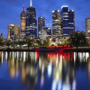 Financial district of Melbourne and River Yarra illuminated at night