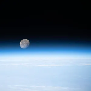 Gibbous Moon just above Earths horizon