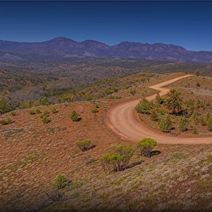 The gravel road winds through the Bunyeroo Valey in the Flinders Ranges national park, South Australia