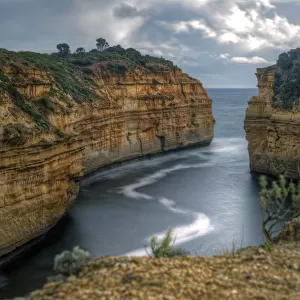 Great Ocean Road limestone cliffs and narrow bay