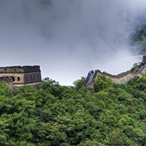 Great Wall of China approaching fog and rain