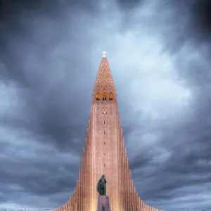 Hallgrimskirkja church lit at cloudy dusk