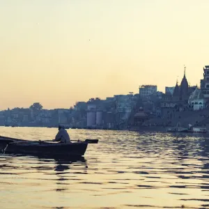 indian people rowing boat in Ganga river varanasi india indian people rowing boat in Ganga river varanasi india