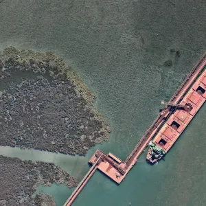 Iron ore facility with ships Iron ore facility with ships