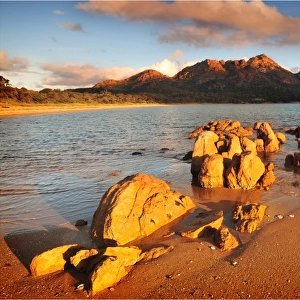 Late afternoon light in the Autumn at Coles bay with views to the Hazards, East coast of Tasmania