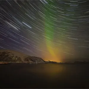 Lauklinnes in winter and the Aurora Borealis, arctic circle of Norway Lauklinnes in winter and the Aurora Borealis, arctic circle of Norway