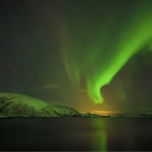 Lauklinnes in winter and the Aurora Borealis, arctic circle of Norway Lauklinnes in winter and the Aurora Borealis, arctic circle of Norway