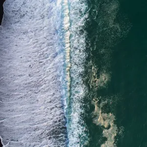 Looking down at black sand beach