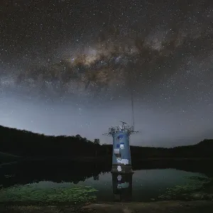 Milky Way over the intake tower in Gold Creek Reservoir in Upper Brookfield, Brisbane, Australia Milky Way over the intake tower in Gold Creek Reservoir in Upper Brookfield, Brisbane, Australia