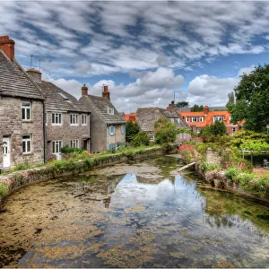 A mill-pond and historic cottages at Swanage, Dorset, England, United Kingdom