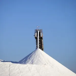 Mining machinery unloading salt at a salt mine