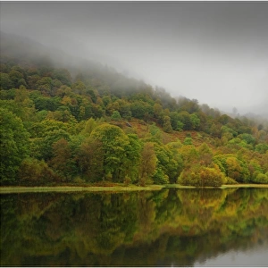 Misty reflections, Esthwaite water, Lakes district, Cumbria, England, United Kingdom