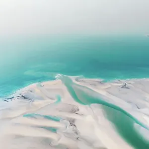 The mouth of Willie Creek estuary at low tide seen from a drone, Western Australia, Australia The mouth of Willie Creek estuary at low tide seen from a drone, Western Australia, Australia