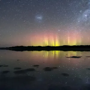 Natures Fireworks, bright beams of the Aurora Australis reflected in water Natures Fireworks, bright beams of the Aurora Australis reflected in water