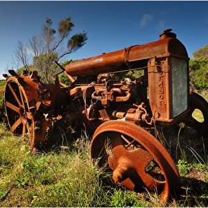Old and abandoned tractor rusting away on King Island, Bass Strait, Tasmania, Australia