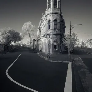 Old landmark building and quiet street with bicycles and road markings in Melbourne, Australia Old landmark building and quiet street with bicycles and road markings in Melbourne, Australia