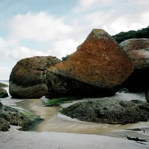 Orange granite boulders on Squeaky Beach, Wilsons Promontory National Park, Australia Orange granite boulders on Squeaky Beach, Wilsons Promontory National Park, Australia