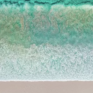 Overhead shot showing Ocean waves breaking onto a beach, Lucky Bay, Esperance, Western Australia, Australia