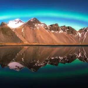 Panoramic view of Aurora Borealis Over Vestrahorn Mountains Panoramic view of Aurora Borealis Over Vestrahorn Mountains