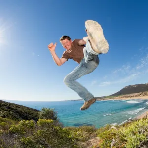 Photographer Robert Lang jumping in the air